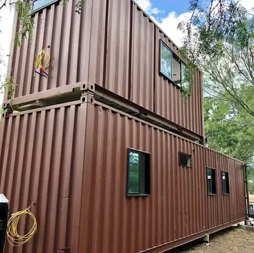 https://www.livinginacontainer.com/wp-content/uploads/2019/09/%E2%80%9CThe-Oaks%E2%80%9D-Helm-Container-Home-by-Cargohome-4.jpg?ezimgfmt=rs:366x366/rscb9/ng:webp/ngcb9