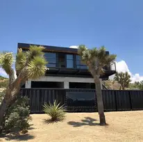 https://www.livinginacontainer.com/wp-content/uploads/2020/05/The-Black-Box-Home-from-Yucca-Valley-5.jpg?ezimgfmt=rs:206x205/rscb9/ng:webp/ngcb9