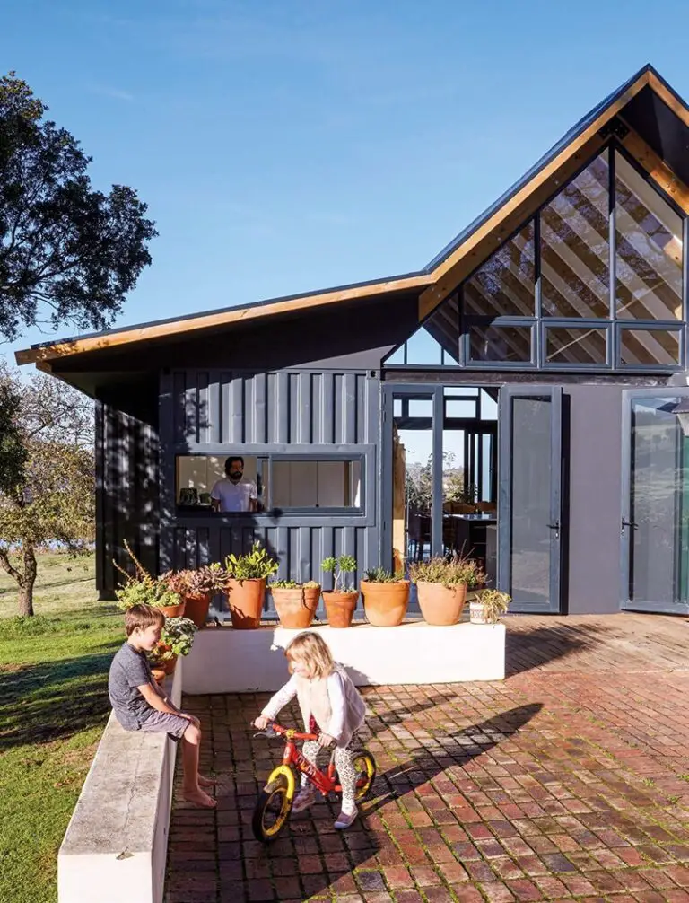 Modern Shipping Container House Connected with Existing Cottage