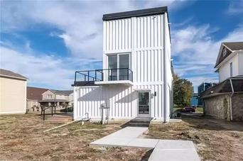 https://www.livinginacontainer.com/wp-content/uploads/2022/01/Indys-Shipping-Container-House-10.jpg?ezimgfmt=rs:342x228/rscb9/ngcb9/notWebP