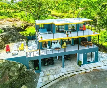 https://www.livinginacontainer.com/wp-content/uploads/2023/02/Stunning-Ocean-View-3-Bedroom-Container-Home-1-1-1024x853.jpg?ezimgfmt=rs:366x305/rscb9/ng:webp/ngcb9